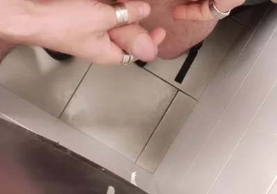 Jerking off a Cock in a Public Toilet