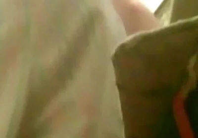 A Young Guy Is Sitting on a Chair with Anal Prolapse
