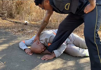 Vigilante Humiliating the Worker