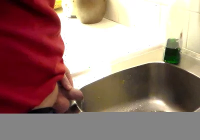 John Is Pissing in the Kitchen Sink