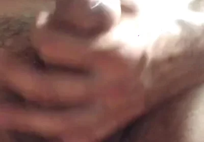 Masturbating