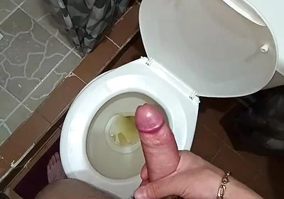 Two Shots of Cum on the Pee in the Bathroom