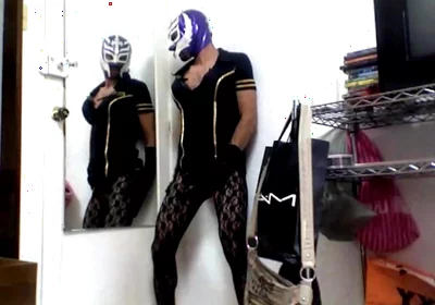 Masked Sissy Crossdresser in Dress and Stockings and Corset Lingerie