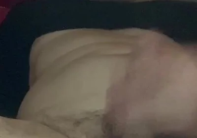Masturbating