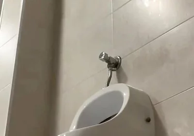 Amateur Twink Boy and Older Guy Caught Having Risky Fun in the Pool's Public Toilets