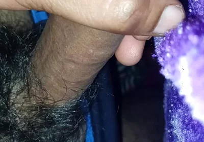 A Indian Young Boy Is Playing with His Penis Inside a Blanket