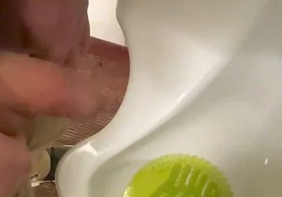 Amateur Redhead Guy Caught Pissing in a Public Toilet's Urinal - He Then Quickly Plays with His Cock Before Leaving