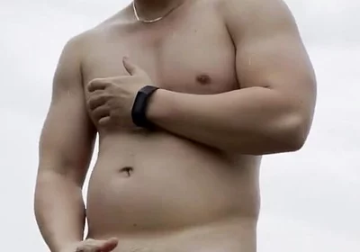 Rain-drenched Highway Exhibitionist: Muscular Stud Strips Naked Amid Rushing Traffic, Flexes, and Explodes in Ecstasy