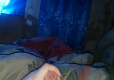 Masturbating