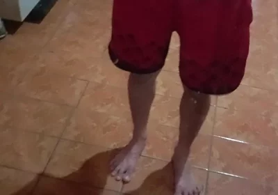 Boy in Red Shorts