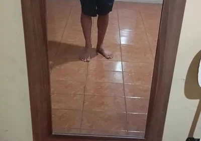 Boy in Shorts in the Mirror