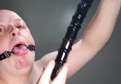Deepthroating an 18 Inch Dildo with Mouth Gag Ring