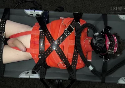 Bondage Twink Strapped to Campbed in Straitjacket and Gas Mask