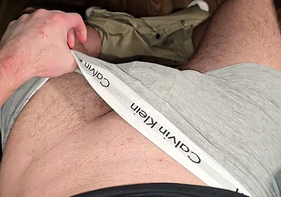 German masked guy rubs huge bulge.. grey Calvins down.. cock dripping heavy