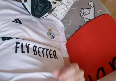 The Guy Is Wearing a Soccer Uniform and Mxhelmet with a Morning Cum