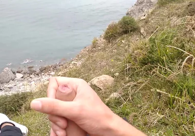 Big Beautiful Big Fat Cock Gets Handjob on the Beach with Gorgeous Sea Views