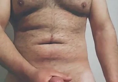 Hairy Big Man Playing with His Dick