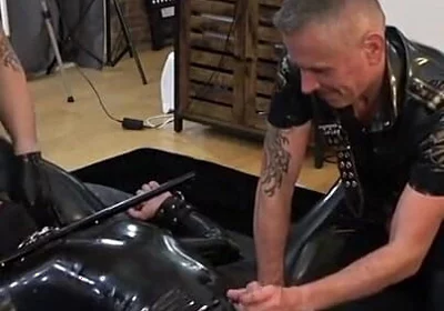 Rubber Gimp Bound and Used by Two Latex Guys Part 1