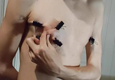 Twink Playing with Binder Clips