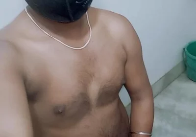 Masturbating