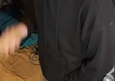 I Masturbate in Sweatpants, a Black Sweatshirt and Nike Sneakers