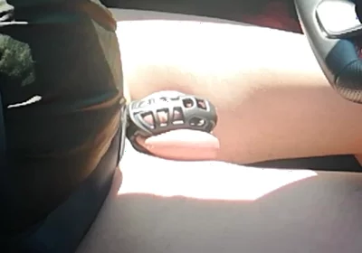 Small Penis in Cage While Driving in Pantyhose