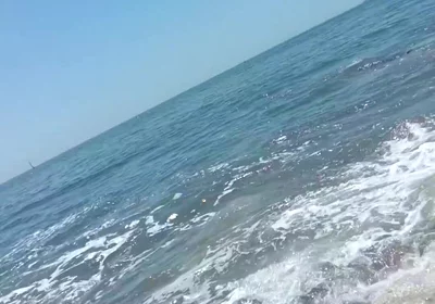 On the Beach on a Sunday