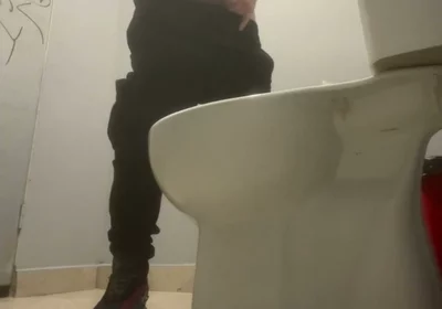Amateur Friends Pissing Together in the Club's Toilets