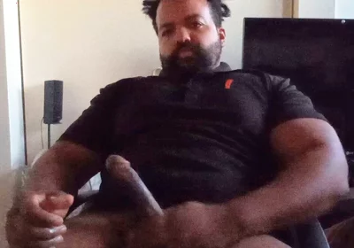 Thick Mixed Latino Bear Jacks off to Porn