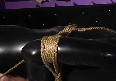 Roped in Latex: Zeus Struggles to Break Free