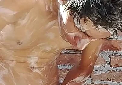 Latin Guy Bathing After a Long Day at Work