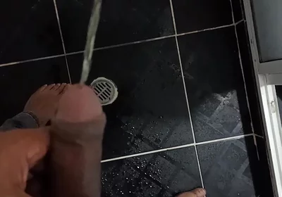 Urinating in Dark Jeans