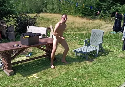 Jerking off While Hanging Out the Laundry