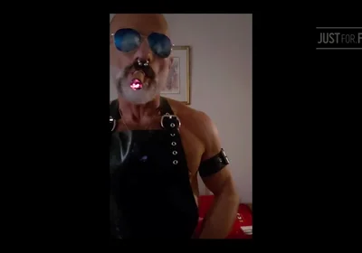 Stepdad lighting his Cigar in rubber apron