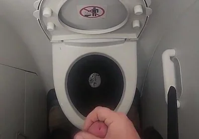 Airplane Bathroom Jerk and Cum.