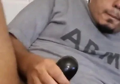 Browndicksavior Using His Oral Sex Toy and Stroking His Brown Cock