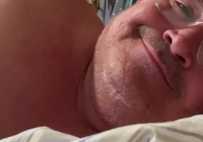 Man Lying in Bed