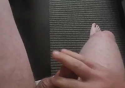 Jerkin While Nude in the Hotel Window.