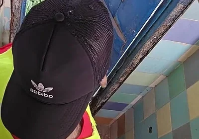 Two Construction Workers Making Out in the Company Bathroom.