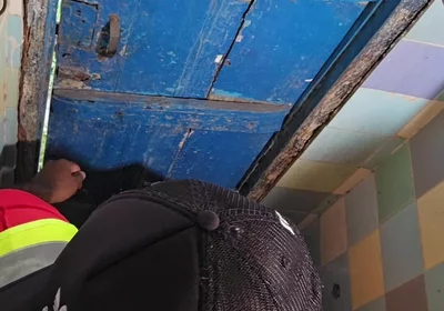 Two Construction Workers Making Out in the Company Bathroom.
